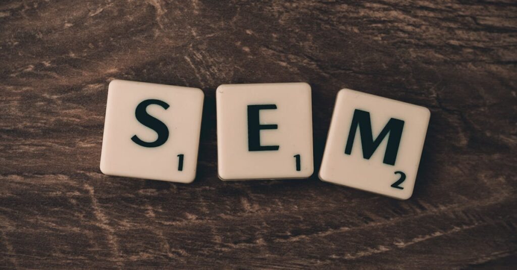 Wooden background with letter tiles spelling SEM, representing search engine marketing.